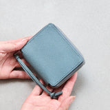 SO36 ROUND ZIP PURSE-VAL