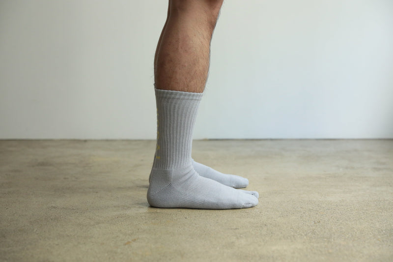 ND21X022GR-ML NODAL LOGO SOCKS - GRAY x YELLOW